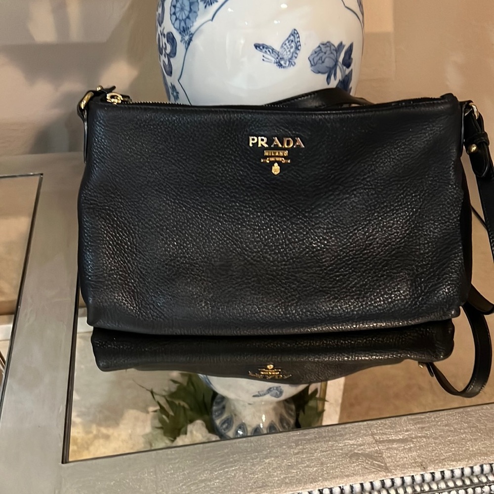 Beautiful all leather Prada, Crossbody bag with authentication card.